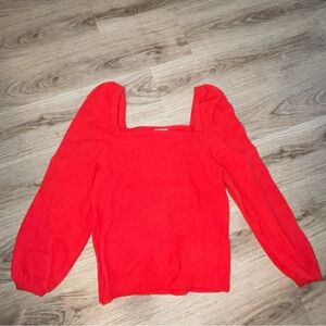 Red sweater with poofy sleeves